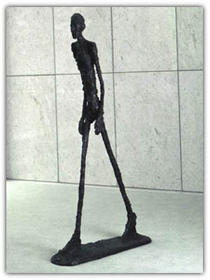 L'uomo che cammina di Giacometti L'uomo che cammina di Giacometti