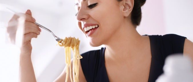 Neuroscienze, un piatto di pasta rende felici: “effetto smile” in tavola