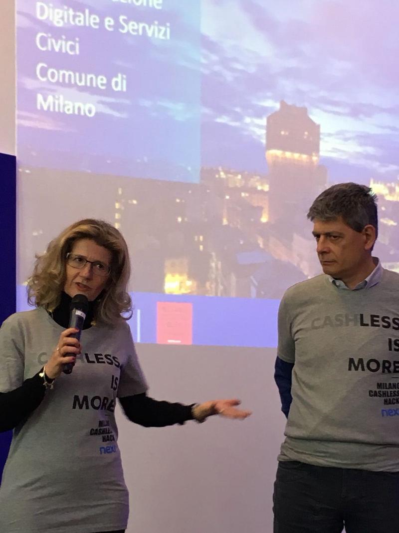 Enrico Trovati, Merchant Services Director di Nexi, e Roberta Cocco, Assessore alle trasformazioni digitali e ai servizi civici del Comune di Milano, al Cashless Milano Hack, l’hackathon organizzato da Nexi in collaborazione con Cariplo Factory e Codemotion. Enrico Trovati, Merchant Services Director di Nexi, e Roberta Cocco, Assessore alle trasformazioni digitali e ai servizi civici del Comune di Milano, al Cashless Milano Hack, l’hackathon organizzato da Nexi in collaborazione con Cariplo Factory e Codemotion.