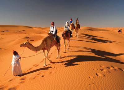 Camel riding Camel Trekking in Oman