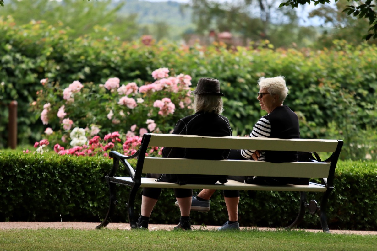 Two people on bench