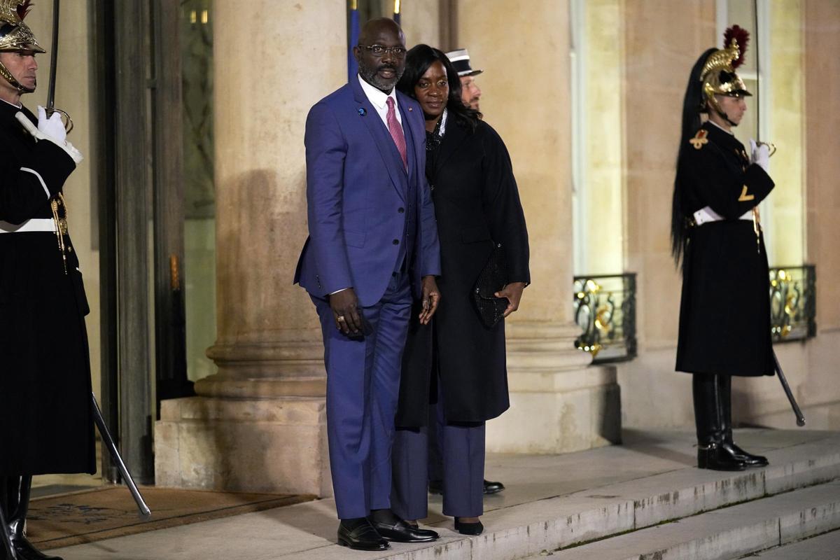 George Weah e la moglie (Lapresse) George Weah e la moglie (Lapresse)