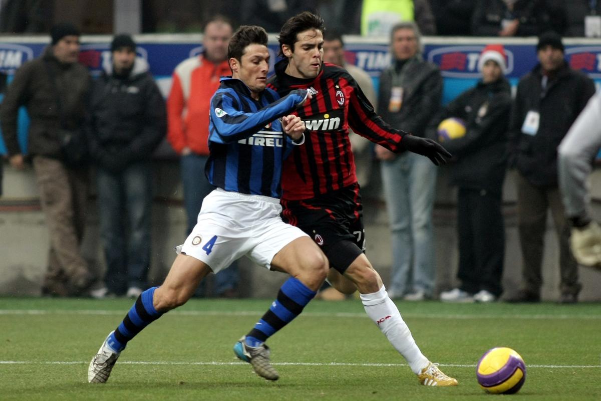 Kakà e Zanetti (foto Lapresse) Kakà e Zanetti (foto Lapresse)