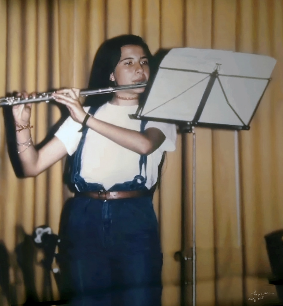 Emanuela Orlandi suona il flauto (plays the flute). Digital Photo Restore. Di Gregorj Cocco. Licenza CC BY-ND Emanuela Orlandi suona il flauto (plays the flute). Digital Photo Restore. Di Gregorj Cocco. Licenza CC BY-ND