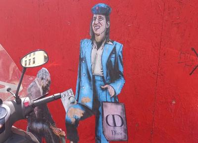 il murales di elly schlein a bologna