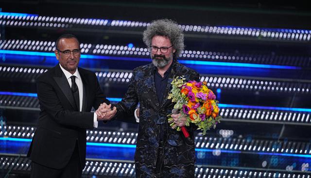 Simone Cristicchi e Carlo Conti - Foto Lapresse Simone Cristicchi e Carlo Conti - Foto Lapresse