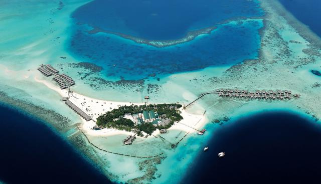 Constance Moofushi: l'isola gioiello nel cuore blu delle Maldive