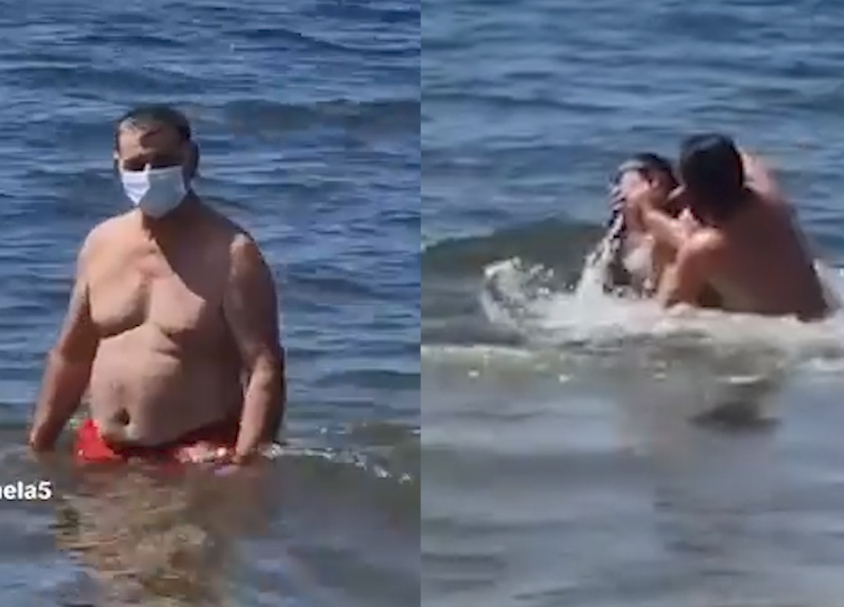 Uomo fa il bagno con la mascherina e viene preso a schiaffi da un bagnante