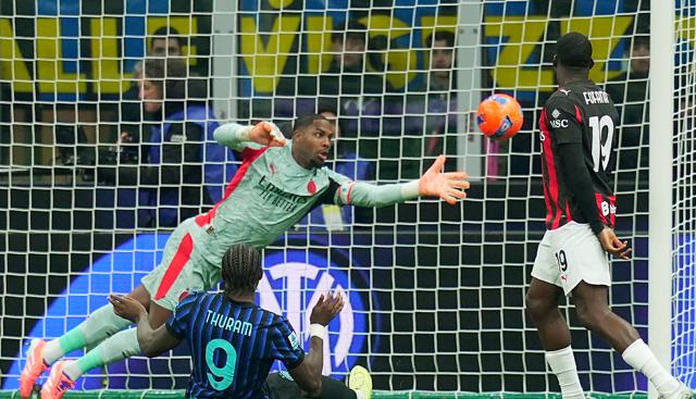 Mike Maignan e Marcus Thuram - foto Lapresse