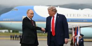 putin trump stretta mano da strillo