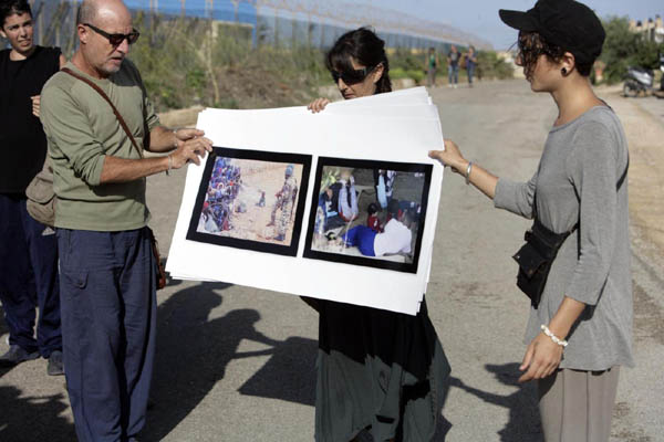 Lampedusa, Letta si inginocchia davanti alle bare Lampedusa, Letta si inginocchia davanti alle bare