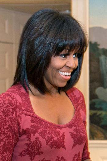 Michelle Obama compie 50 anni si dà allo yoga