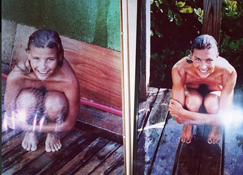 Naike nuda tra le lenzuola con cane e gatto