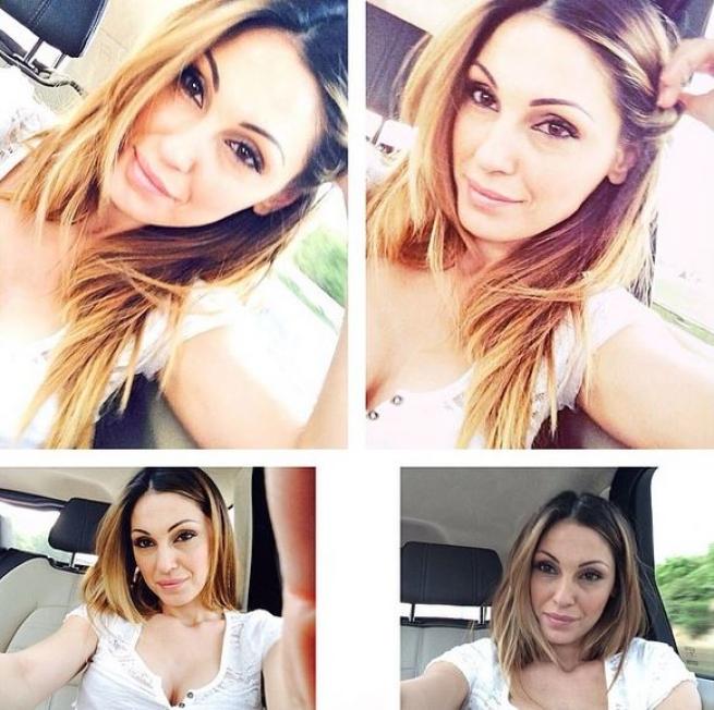 Anna Tatangelo alza la canotta, s’impennano i selfie