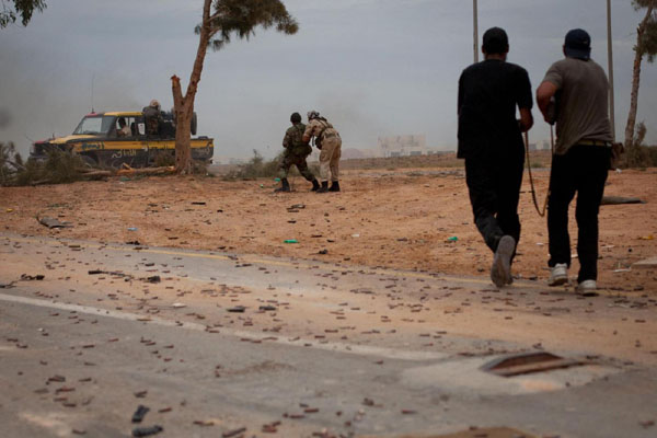 Isis, video e foto dei 21 copti decapitati. Guarda