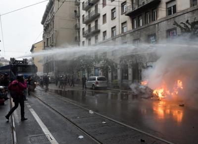 ‘No Expo’, guerriglia a Milano. Cinque italiani fermati, Comune parte civile ‘No Expo’, guerriglia a Milano. Cinque italiani fermati, Comune parte civile
