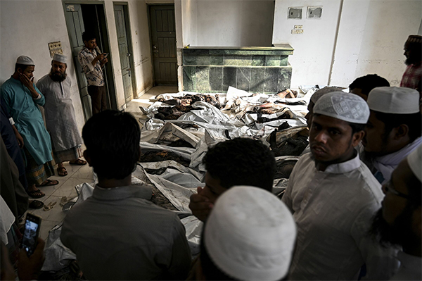 Bangladesh: a fuoco un condominio a Dakka, almeno 70 morti. FOTO Bangladesh: a fuoco un condominio a Dakka, almeno 70 morti. FOTO