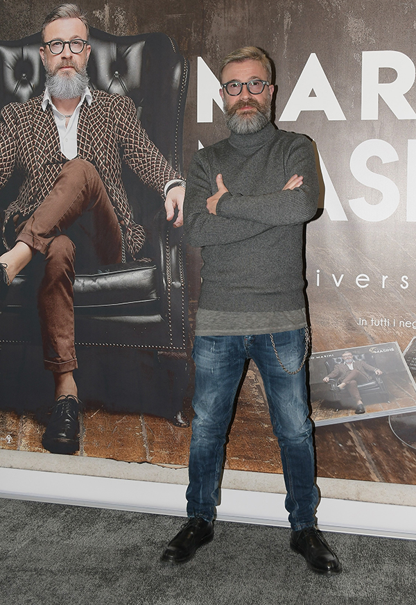 Marco Masini festeggia sul palco di Sanremo