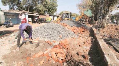 India, un muro per nascondere i poveri durante la visita di Trump