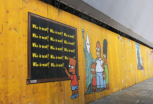 AleXsandro Palombo street artist con i Simpson ricorda George Floyd a Milano AleXsandro Palombo street artist con i Simpson ricorda George Floyd a Milano