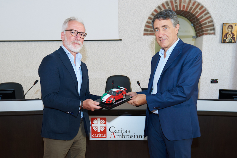 Porsche Italia e la rete vendita donano 1,3 milioni di euro alla Caritas Porsche Italia e la rete vendita donano 1,3 milioni di euro alla Caritas