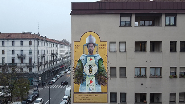 Sant’Ambrogio, murale a Milano per il patrono. FOTO