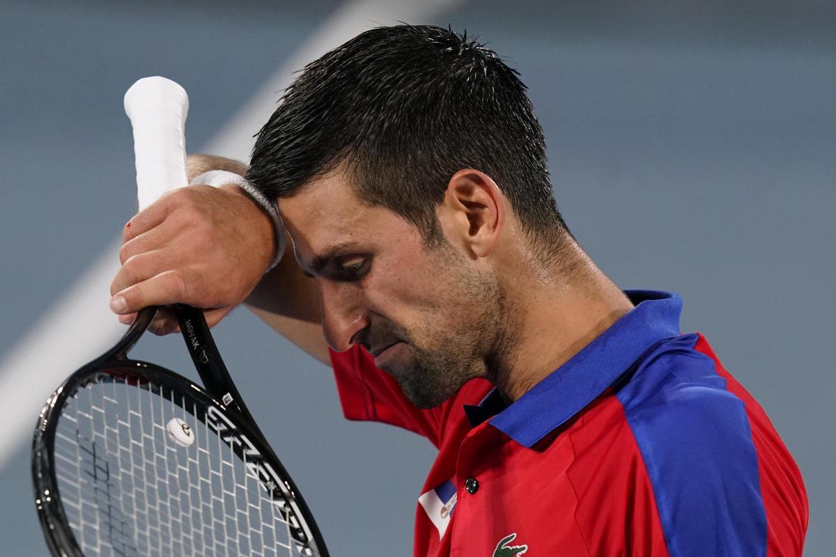 Djokovic flop a Tokyo 2020: il ‘cannibale’ del tennis senza medaglie olimpiche Djokovic flop a Tokyo 2020: il ‘cannibale’ del tennis senza medaglie olimpiche