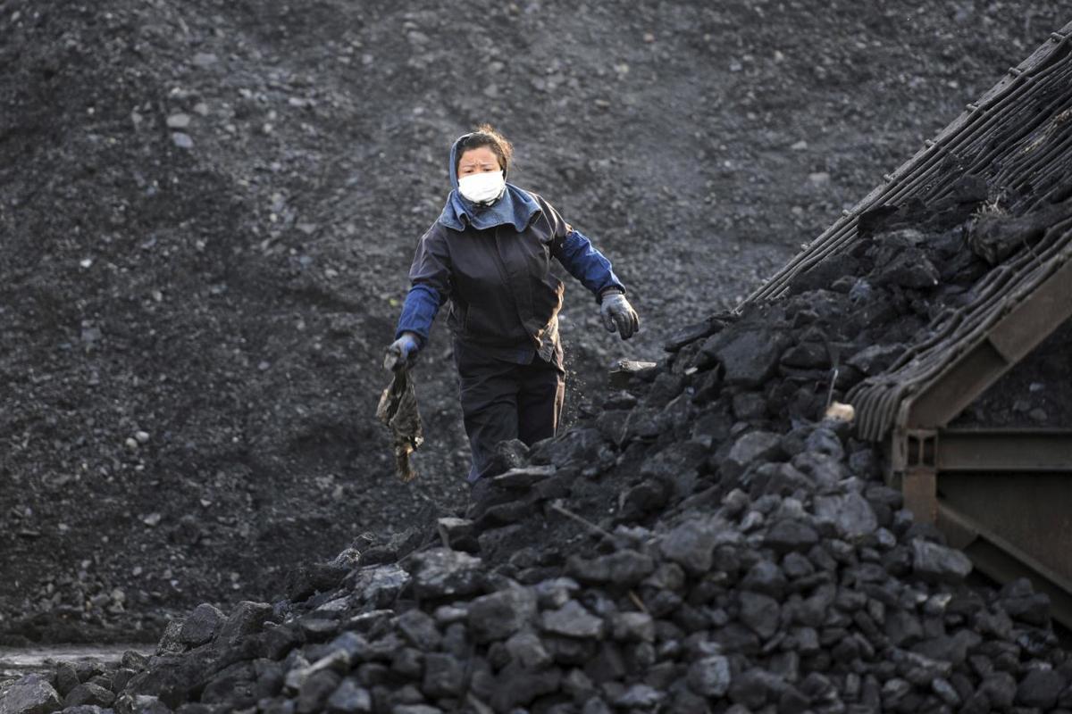 Cina,impianti chiusi e luce razionata.La crisi energetica minaccia la crescita Cina,impianti chiusi e luce razionata.La crisi energetica minaccia la crescita