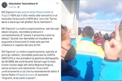 Dito medio della volontaria ai braccianti, bufera sull’associazione di carità