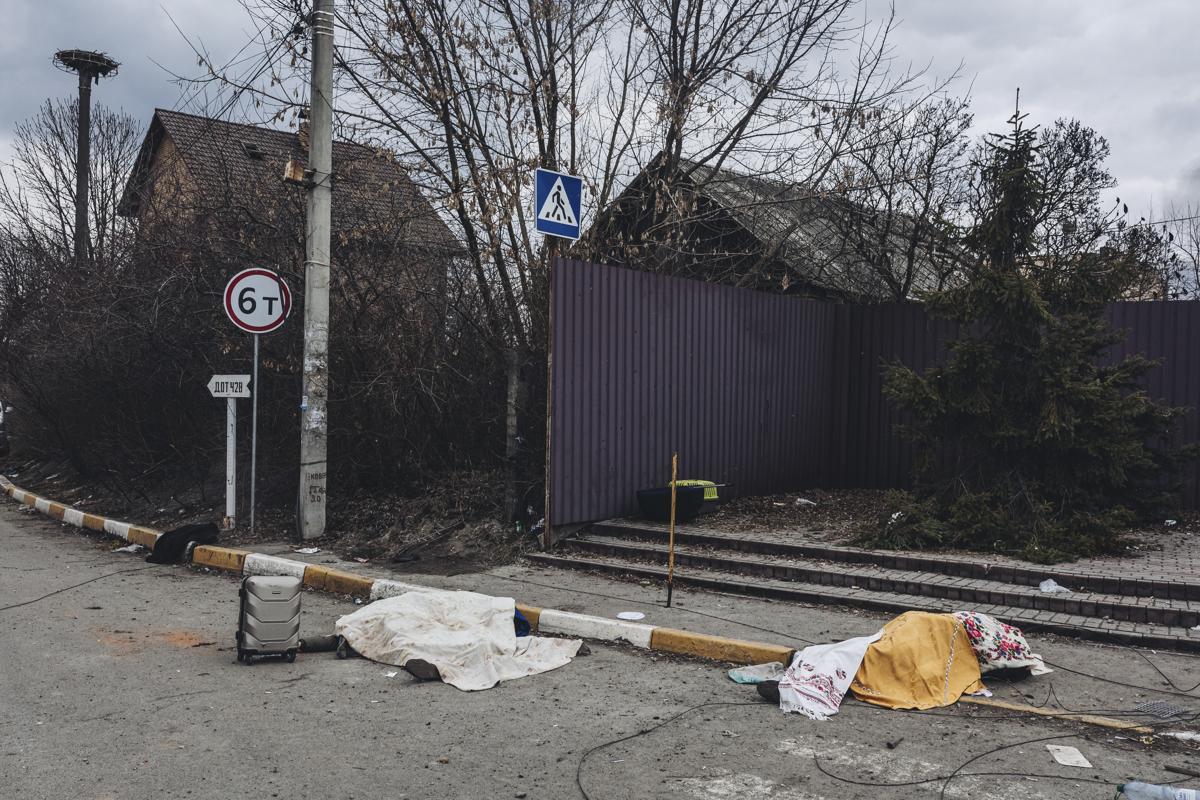 Ucraina, orrore in una foto del Nyt: madre e figli morti fuggendo a Kiev Ucraina, orrore in una foto del Nyt: madre e figli morti fuggendo a Kiev