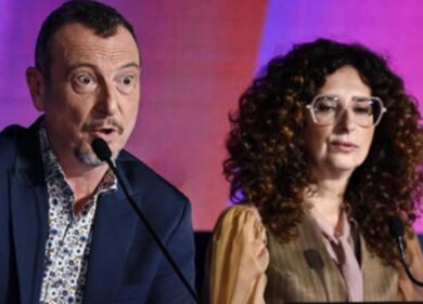 Amadeus stizzito: “John Travolta sapeva tutto sul ballo del qua qua”