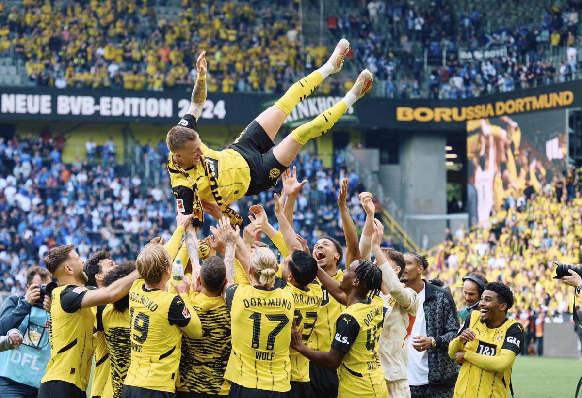 Borussia Dortmund, produttore di armi come sponsor: polemica in Germania Borussia Dortmund, produttore di armi come sponsor: polemica in Germania