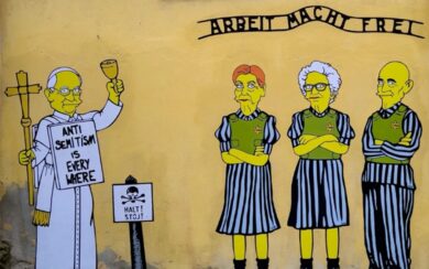 Milano, sfregiato con una svastica il murales dedicato a Segre, Modiano e Bruck