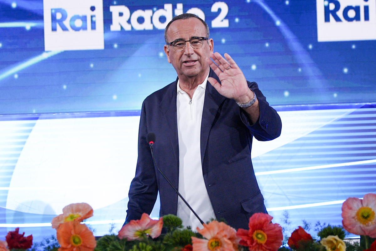 Sanremo 2026, Carlo Conti: “Sarà un Festival in ricordo di Pippo Baudo. Meloni? Può venire se compra il biglietto” Sanremo 2026, Carlo Conti: “Sarà un Festival in ricordo di Pippo Baudo. Meloni? Può venire se compra il biglietto”